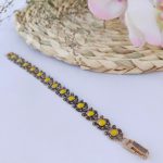 دستبند زنانه مارگازیت طلاروس گل شیپوری نگین زرد با قیمت مناسب